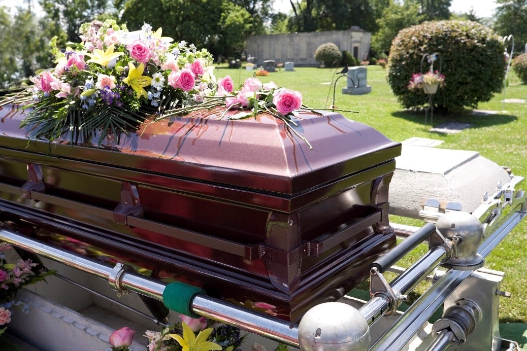 This is a brown wooden casket